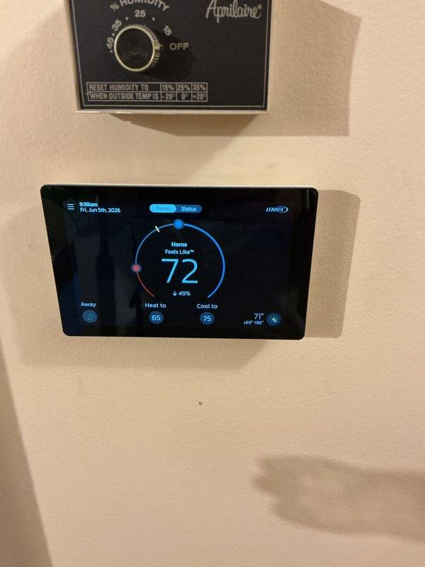 Completed Gold AC Inspection on a one-year-old HVAC system with air handler located in basement. Performed comprehensive maintenance including visual inspection of furnace, air handler unit, condensate drain lines, and ductwork. Verified proper operation of Lennox digital thermostat and Aprilaire humidistat control system. Confirmed all PVC drainage piping connections were secure and functioning correctly. System operating normally with no deficiencies noted at time of inspection.