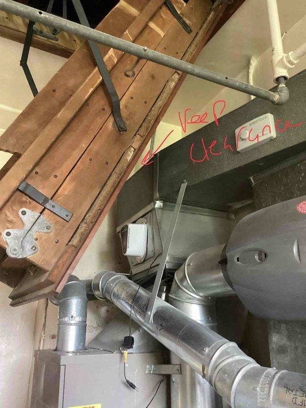 Provided comprehensive estimate for complete HVAC system replacement including air conditioning unit and natural gas furnace for 20+ year old equipment located in utility room with ductwork extending into attic space. Assessed existing system configuration, ductwork condition, and installation requirements for new equipment. Documented current system layout including air handler, galvanized metal ductwork, condensate drain lines, and attic access for future installation planning.