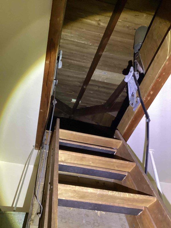 Provided comprehensive estimate for complete HVAC system replacement including air conditioning unit and natural gas furnace for 20+ year old equipment located in utility room with ductwork extending into attic space. Assessed existing system configuration, ductwork condition, and installation requirements for new equipment. Documented current system layout including air handler, galvanized metal ductwork, condensate drain lines, and attic access for future installation planning.