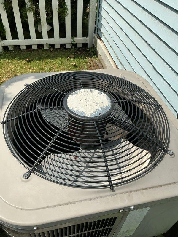 Completed routine annual Gold AC inspection and tune-up on residential Rheem air conditioning system. System was operating properly upon arrival. Performed comprehensive cooling maintenance including inspection of outdoor condenser unit, verified proper operation of fan assembly and protective grille, checked electrical connections at exterior junction box and conduit, measured system performance parameters, and confirmed all components functioning within manufacturer specifications. Unit found in good working condition with no repairs required.