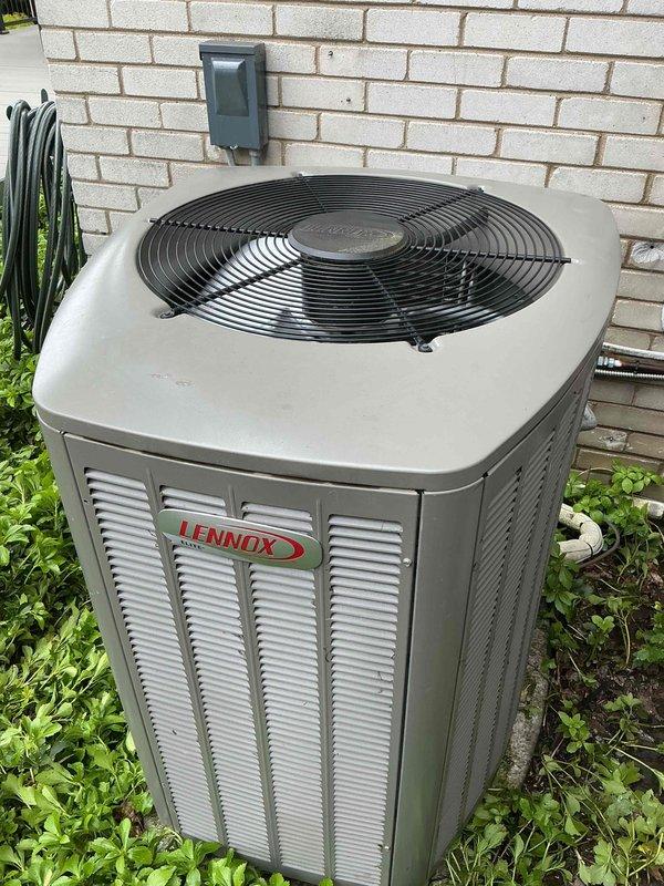 Completed comprehensive Gold AC inspection on Lennox condenser unit under 10 years old with air handler located in basement. System confirmed operational and performing properly. Advised customer to maintain clear area around outdoor condenser unit, removing any debris and animal waste to ensure proper airflow and optimal equipment performance.