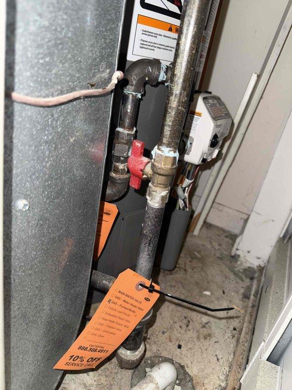 Responded to no cooling call with blank thermostat display. Upon arrival, found 10+ year old cooling system with coil located in basement. Performed diagnostic inspection of HVAC equipment and electrical components. Identified thermostat power issue preventing system operation. Inspected furnace cabinet, refrigerant lines, condensate piping, and associated electrical connections. Documented equipment condition and provided customer with repair recommendations prior to potential system replacement.