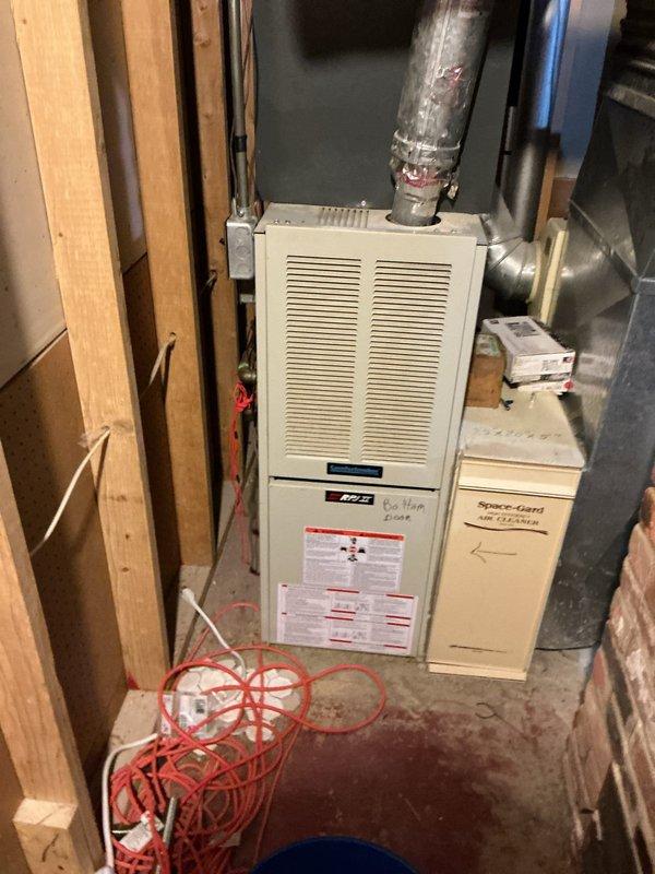 Responded to no cooling complaint on 6-year-old air conditioning system. Upon inspection, identified compressor wiring issue requiring replacement parts on order from supplier. Documented existing electrical connections at junction box and refrigerant line configuration for upcoming repair work once wiring harness arrives.