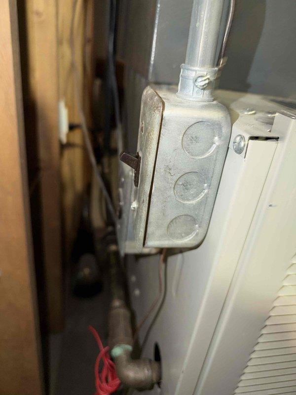 Responded to no cooling complaint on 6-year-old air conditioning system. Upon inspection, identified compressor wiring issue requiring replacement parts on order from supplier. Documented existing electrical connections at junction box and refrigerant line configuration for upcoming repair work once wiring harness arrives.