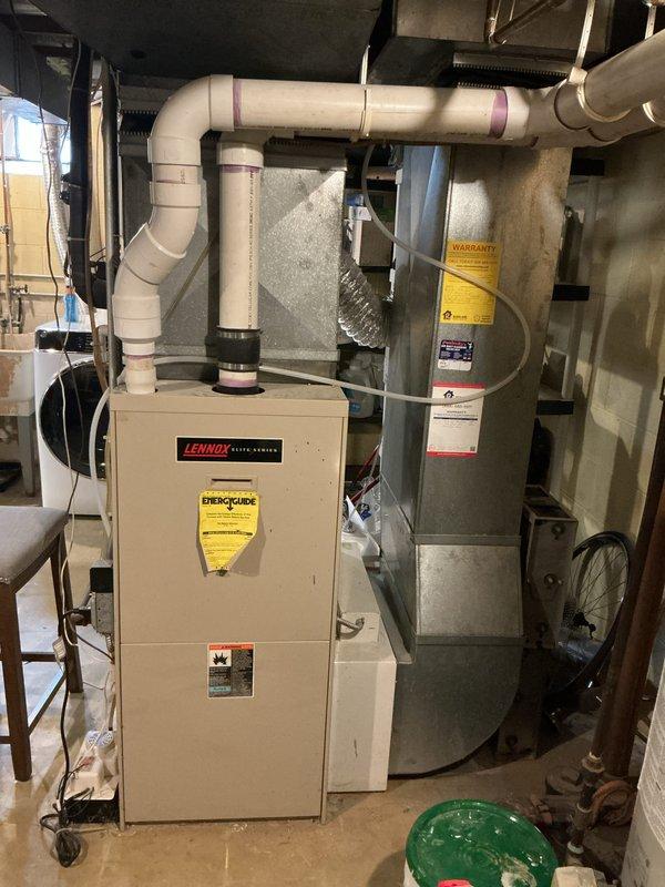 Completed estimate for replacement of heating and cooling system in medium-sized residential property. Assessed basement installation requirements for Lennox vertical upflow/downflow gas furnace and air conditioning system rated for 1500-3000 square feet. Evaluated existing HVAC infrastructure, ductwork connections, and natural gas supply configuration to determine scope of replacement work and equipment specifications.