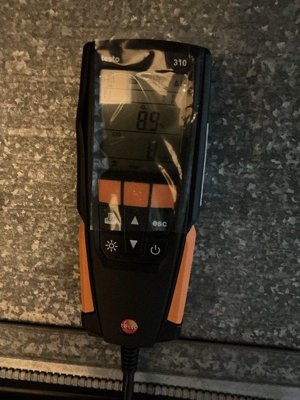 Completed comprehensive tune-up service on 4-year-old furnace and tanked water heater located in basement. Performed full system inspection of HVAC equipment including air handler, ductwork, and Aprilaire humidification component. Conducted combustion analysis testing using Testo 310 analyzer to verify proper furnace operation and efficiency levels, confirming safe combustion parameters. Inspected all accessible components, electrical connections, and filter access panels. Verified proper operation of water heater and documented equipment conditions with photographic records for maintenance history.