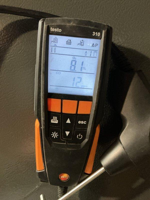Performed routine AC tune-up on 3-year-old system located outside and furnace in basement. Conducted combustion analysis using Testo 310 analyzer, measuring oxygen and carbon monoxide levels to verify safe and efficient operation. Inspected electrical control panel, wiring connections, and safety switches to ensure proper system functionality. System completed work order without complications.