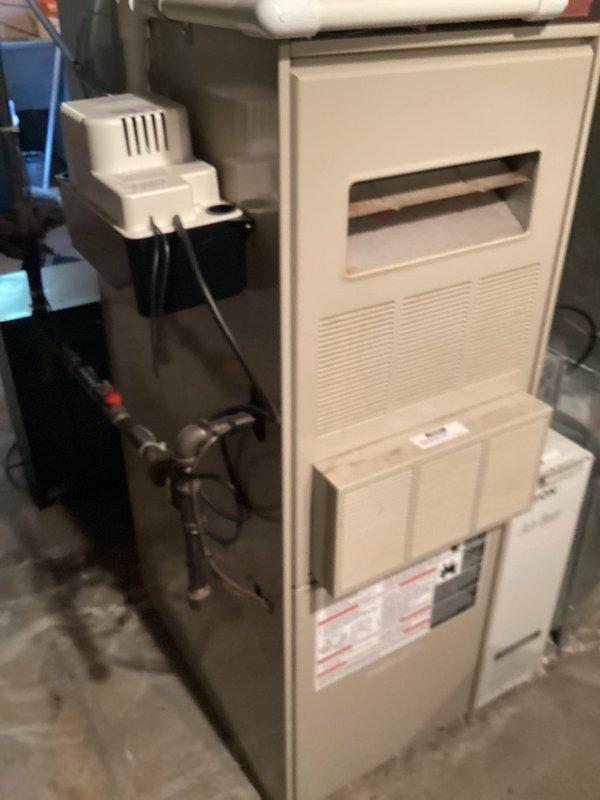 Provided comprehensive estimate for replacement of 28-year-old natural gas furnace and air conditioning system, with existing equipment located in basement and outside respectively. Current system experiencing operational issues and nearing end of service life. Evaluated existing installation including gas line connections, humidifier integration, and outdoor condenser unit to determine proper replacement specifications and equipment requirements.