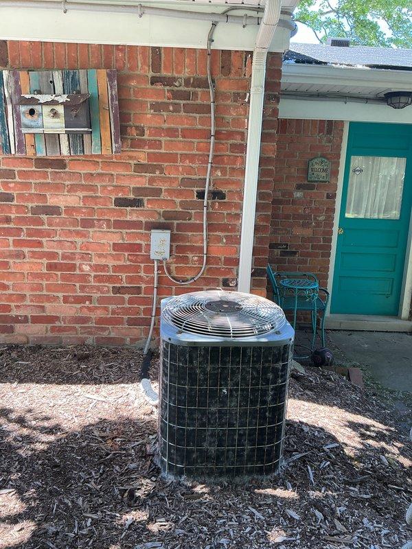 Completed full system HVAC estimate for 30-year-old residential heating and cooling equipment with cracked heat exchanger identified in basement-located air handler. Inspected exterior condenser unit and interior components, documented existing system configuration with thermostat controls, and provided comprehensive replacement quote for complete system upgrade due to age and compromised heat exchanger safety concern.