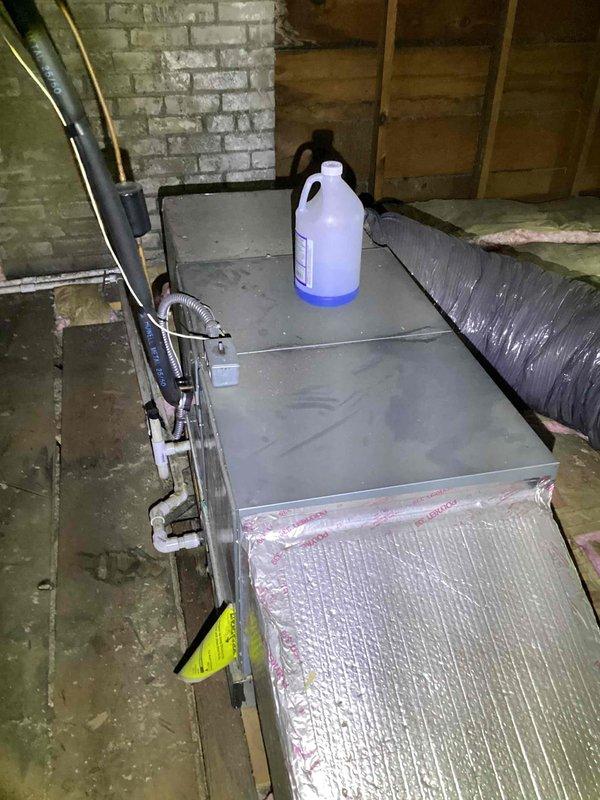 Completed comprehensive AC system inspection and replacement estimate for residential property. Inspection included attic-mounted equipment requiring ladder access, assessment of existing ductwork system with reflective insulation in basement/crawl space area, and evaluation of ventilation components including ceiling-mounted return air grille showing filter contamination. Documentation captured existing HVAC infrastructure, metal ductwork conditions, and mechanical components to provide accurate replacement recommendations.