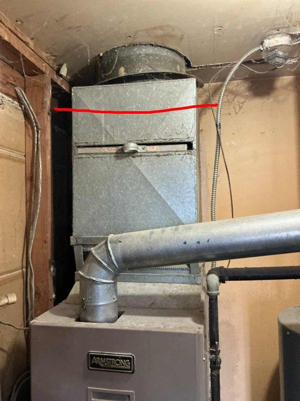Completed comprehensive estimate for replacement of existing 30-year-old air conditioning unit and Armstrong UltraSX furnace system at owner-occupied single-family residence. Evaluated current HVAC equipment including exterior condenser unit located behind home and interior furnace installation with associated ductwork and plenum chamber. Documented existing system configuration through photographic assessment showing furnace unit, cylindrical metal plenum with galvanized ductwork, and overall mechanical room layout to provide accurate replacement specifications.