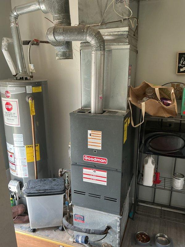 Completed comprehensive furnace inspection and tune-up on Goodman heating unit located in basement utility area. Performed visual inspection of furnace components, verified proper operation of burners and heat exchanger, checked gas connections and pressures, inspected flue venting system, tested safety controls and limit switches, and evaluated overall system performance. Unit found to be in satisfactory operating condition with no immediate repairs required; documentation and inspection report forwarded to property management per tenant request.