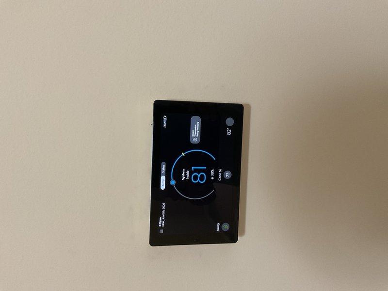 Completed full HVAC system installation on second floor including new furnace with base assembly and air conditioning unit. Installed S40 smart thermostat with programmable temperature controls and connectivity features. System includes integrated humidifier unit with proper drainage routing via white PVC piping. All refrigerant lines, electrical connections, and control wiring professionally installed and tested. Permit requested and utility rebate applications submitted for energy-efficient equipment qualifying for consumer and utility company incentive programs.