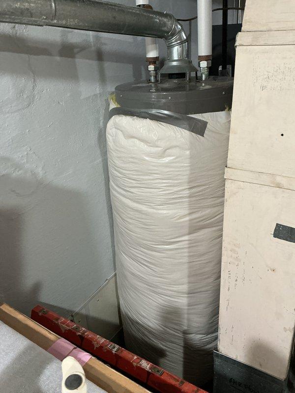 Completed comprehensive Gold AC inspection on 10+ year old single-unit system with basement-located air handler. System currently operational at time of service. Performed full multi-point inspection including thermostat functionality verification, refrigerant level assessment, electrical connection testing, and condensate drain evaluation. Inspected ductwork connections and insulation integrity at air handler location. Thermostat displaying proper temperature readings and responding to programmed settings. All mechanical components examined for wear and proper operation consistent with equipment age. System operating within normal parameters for cooling season.