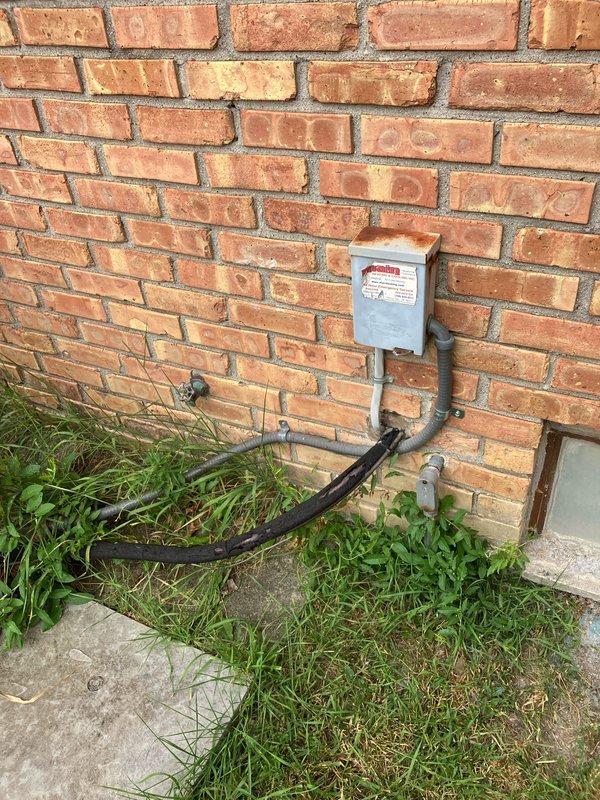 Provided replacement estimate for 15-year-old air conditioning system that is barely operational. Unit is located in basement and operates in conjunction with natural gas furnace. Evaluated existing Emerson programmable thermostat, exterior disconnect box, and conduit routing to determine replacement specifications and requirements for new HVAC equipment installation.