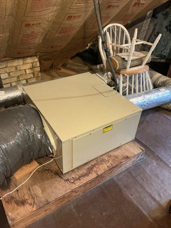 Completed comprehensive Gold AC Inspection on residential cooling system with air handler located in basement. Performed full system evaluation including thermostat operation verification, attic-mounted equipment inspection, and ductwork assessment. System confirmed operational with all components functioning properly at time of service.