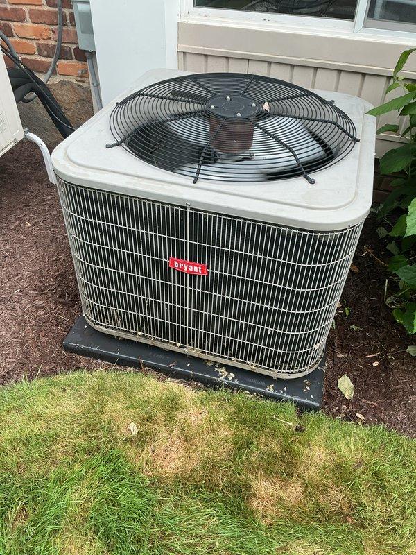 Completed comprehensive Gold AC inspection and preventative maintenance on 6-year-old residential air conditioning system. Attic-located air handler and outdoor condensing unit inspected and serviced per manufacturer specifications.

**Outdoor Condensing Unit:**
Inspected condenser unit positioned on mounting pad with proper clearances maintained. Verified fan motor operation and blade condition - fan guard secure with no obstructions. Cleaned condenser coil fins and straightened any bent fins to optimize airflow and heat transfer efficiency. Checked refrigerant lines for proper insulation and signs of wear or damage. Inspected electrical connections, contactor operation, and capacitor performance. Verified proper amp draw on compressor and fan motor. Checked unit level on pad and confirmed secure mounting. Cleared debris from base and surrounding area.

**Attic Air Handler:**
Performed complete inspection of indoor air handling unit. Replaced air filter with proper size and MERV ratin