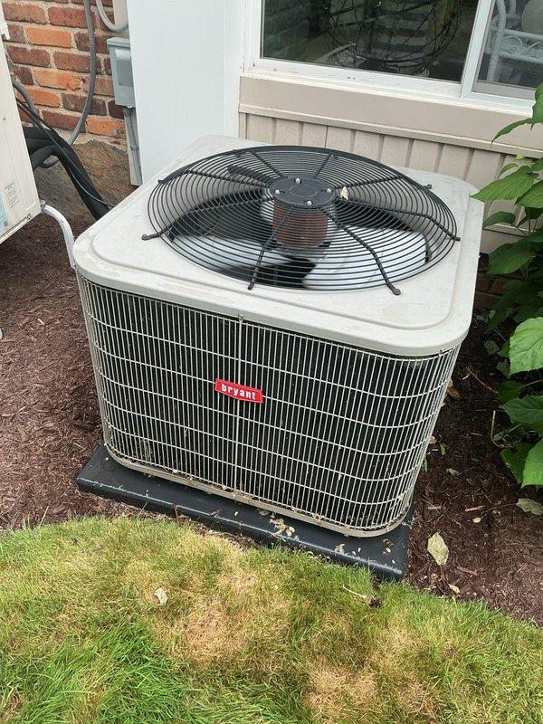 Completed comprehensive Gold AC inspection and preventative maintenance on 6-year-old residential air conditioning system. Attic-located air handler and outdoor condensing unit inspected and serviced per manufacturer specifications.

**Outdoor Condensing Unit:**
Inspected condenser unit positioned on mounting pad with proper clearances maintained. Verified fan motor operation and blade condition - fan guard secure with no obstructions. Cleaned condenser coil fins and straightened any bent fins to optimize airflow and heat transfer efficiency. Checked refrigerant lines for proper insulation and signs of wear or damage. Inspected electrical connections, contactor operation, and capacitor performance. Verified proper amp draw on compressor and fan motor. Checked unit level on pad and confirmed secure mounting. Cleared debris from base and surrounding area.

**Attic Air Handler:**
Performed complete inspection of indoor air handling unit. Replaced air filter with proper size and MERV ratin