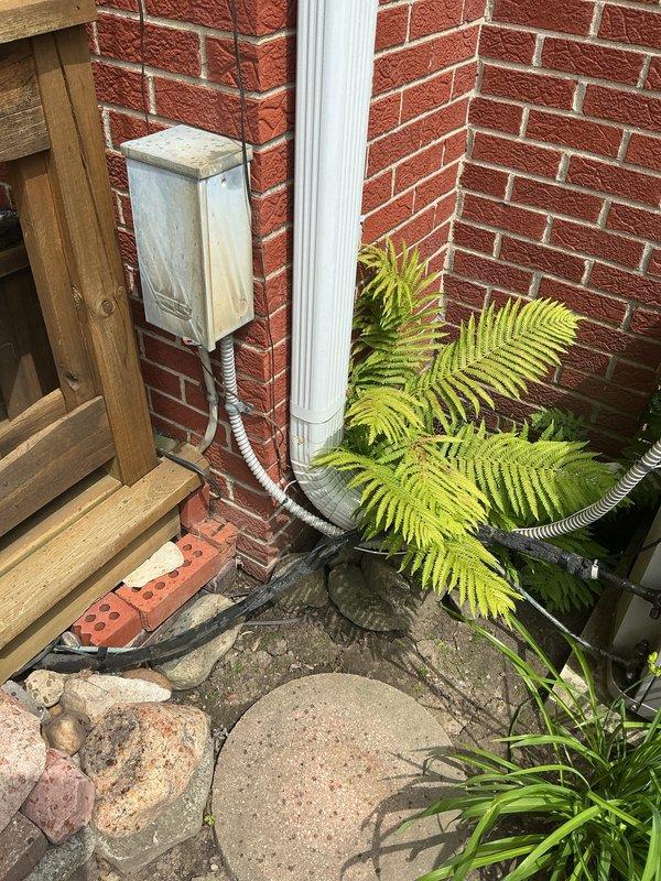 Completed comprehensive assessment of existing HVAC system utilizing R22 refrigerant for full system replacement estimate. Evaluated indoor air handler unit located in basement utility area and documented current equipment configuration, including furnace assembly, PVC condensate drainage system, and associated ductwork. Inspected outdoor condensing unit mounted on exterior brick wall near building foundation, noting electrical connections and drainage components. Provided detailed equipment replacement recommendations due to obsolete R22 refrigerant system, including specifications for modern high-efficiency heating and cooling equipment compatible with current environmental standards.