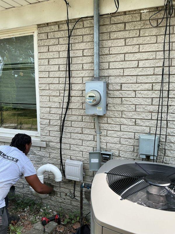 Completed full HVAC system installation including 135,000 BTU furnace with humidifier, air conditioning condenser unit, S40 thermostat with 3 smart sensors and wireless extender, high velocity ductwork package, condensate pump, and base plenum. Coordinated electrical work for system connections and reconnection of existing components. Secured mechanical and electrical permits, installed outdoor condenser unit with proper mounting and refrigerant lines, configured smart thermostat system with multiple zone sensors for optimal climate control throughout residence, and registered system under AHRI certificate 216722778 for utility rebate eligibility.