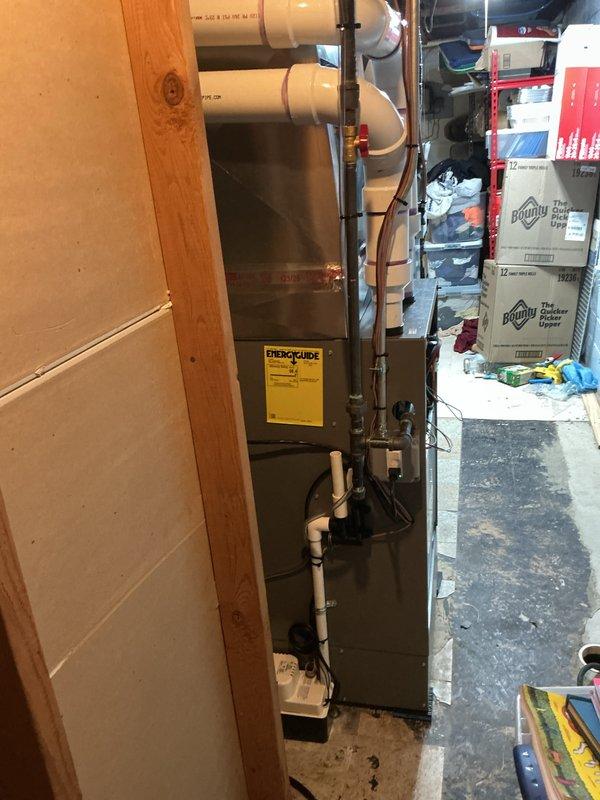 Completed full HVAC system installation including 135,000 BTU furnace with humidifier, air conditioning condenser unit, S40 thermostat with 3 smart sensors and wireless extender, high velocity ductwork package, condensate pump, and base plenum. Coordinated electrical work for system connections and reconnection of existing components. Secured mechanical and electrical permits, installed outdoor condenser unit with proper mounting and refrigerant lines, configured smart thermostat system with multiple zone sensors for optimal climate control throughout residence, and registered system under AHRI certificate 216722778 for utility rebate eligibility.