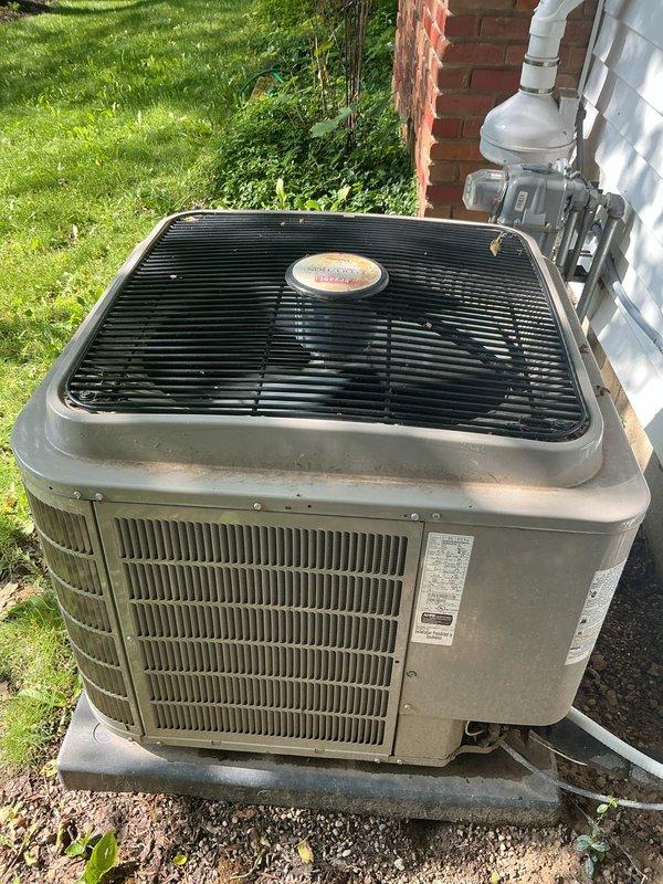 Completed comprehensive Gold AC Inspection on 2018 residential air conditioning system with outdoor condenser unit located on concrete pad and basement air handler. Performed thorough multi-point inspection including refrigerant level check, electrical connection testing, capacitor evaluation, contactor inspection, and airflow assessment. Verified proper operation of condenser fan motor, examined coil conditions both indoor and outdoor units, inspected condensate drain line for proper drainage, and confirmed thermostat functionality. All components found operating within manufacturer specifications with no immediate repairs required at this time.