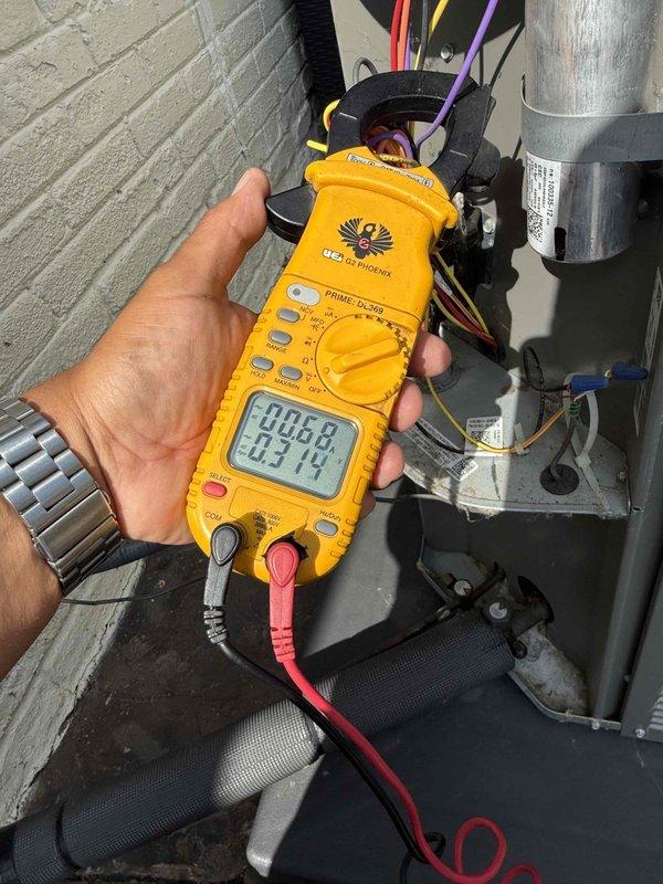 Responded to service call for thermostat not matching set temperature on 10+ year old cooling system located in basement. Performed diagnostic testing on outdoor condensing unit using digital multimeter to measure electrical values and amp draw. Checked capacitor, compressor, and control wiring connections for proper voltage and current flow. All electrical components tested within normal operating parameters. Verified proper communication between thermostat and outdoor unit, ensuring accurate temperature control and system cycling.