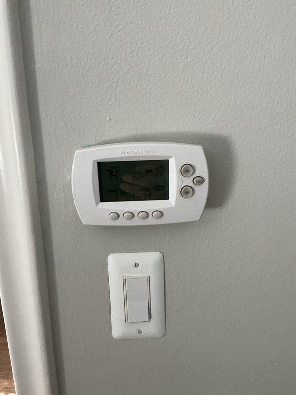 Responded to no cooling complaint and performed diagnostic assessment of air conditioning system. Inspected electrical panel and thermostat to evaluate system operation and identify cause of failure. Documented existing equipment configuration and provided estimate for complete system replacement.