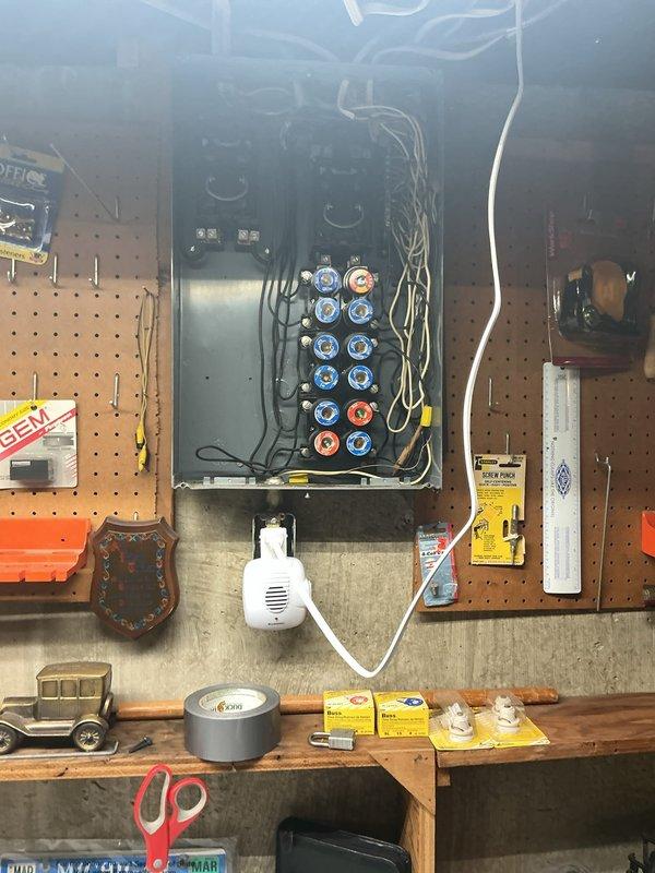 Conducted on-site evaluation of existing electrical service panel located in basement to provide upgrade recommendations. Inspected current panel configuration, assessed capacity and condition of existing breakers and bus bars, and documented exterior meter installation showing dual digital meters with associated conduit routing. Evaluated electrical load requirements and provided detailed assessment for panel replacement specifications to meet current electrical code standards and homeowner's service needs.