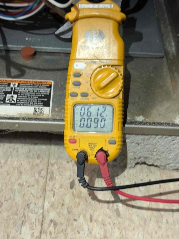 Completed comprehensive Gold AC inspection on residential split system with outdoor condenser unit and basement air handler. System is over 10 years old and operational at time of service. Performed thorough visual inspection of outdoor condenser unit, noting age-related weathering and dirt accumulation on exterior panels. Inspected refrigerant line connections, electrical conduit, and verified unit stability on concrete pad. Conducted electrical diagnostics using digital multimeter to measure voltage and amperage readings, confirming proper electrical performance within manufacturer specifications. Inspected air handler components in basement location. Provided complimentary air filter replacement as scheduled courtesy. All system components functioning properly with no immediate service needs identified. Unit continues to operate effectively despite age of equipment.