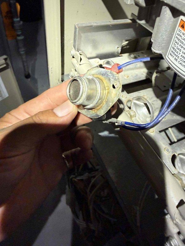 Performed comprehensive inspection and tune-up on 10+ year old cooling system located in basement. Cleaned outdoor condenser unit, including coils and electrical connections, removing accumulated debris and vegetation growth. Inspected and tested capacitor, refrigerant lines, and electrical components; removed corroded sensor assembly for examination and cleaning. All refrigerant connections secured and system operational upon completion.