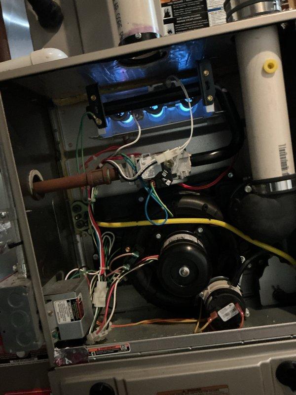 Completed preventive maintenance on two furnace units and two air conditioning systems, performing comprehensive inspections of all mechanical and electrical components. Replaced two thermostats—one on the first floor and one upstairs—with auto-changeover models capable of automatically switching between heating and cooling modes for seasonal transitions. Verified proper operation of gas burners, blower motors, control boards, and electrical connections on both HVAC systems; all units tested and confirmed operational with no issues identified.