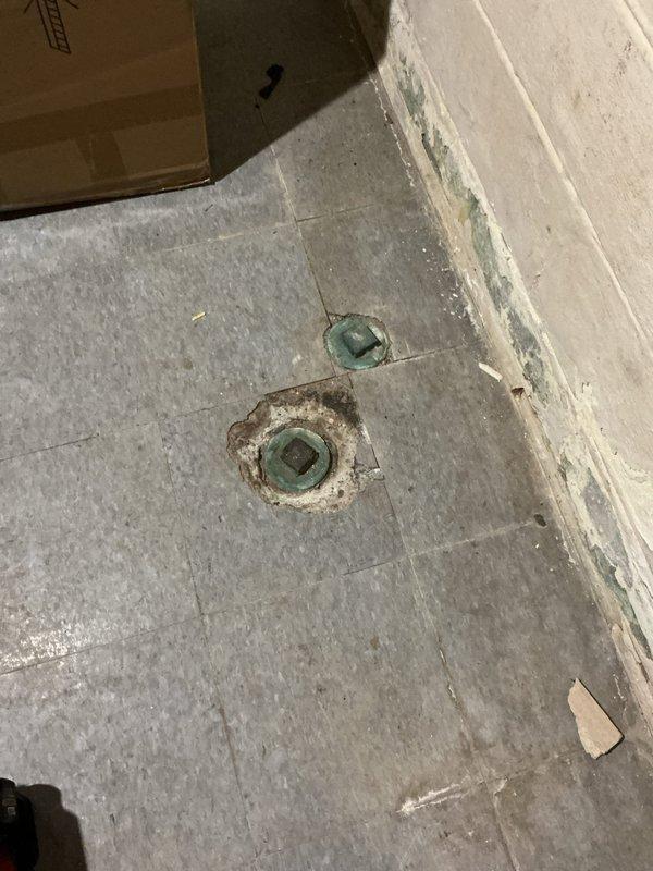 Responded to a clogged drain issue in the basement of a 50+ year old home that began the previous day. Located and accessed the basement floor cleanout, which showed significant age-related deterioration and staining around the drain covers. Successfully snaked the cleanout line to clear the blockage, restoring proper drainage to the affected area.
