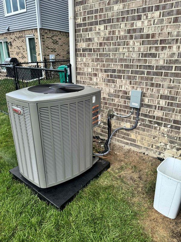 Successfully completed installation of a 3.5-ton air conditioning condenser unit and evaporator coil system in rear yard location. The outdoor condenser was positioned on a protective pad adjacent to the residence with proper refrigerant line connections, electrical conduit routing, and disconnect box mounted to exterior wall. Inside, the evaporator coil was integrated with the existing air handler unit, with all necessary ductwork connections completed. All mechanical, electrical, and air conditioning permits were secured prior to installation, and electrical work was coordinated as required for system reconnection and proper operation.