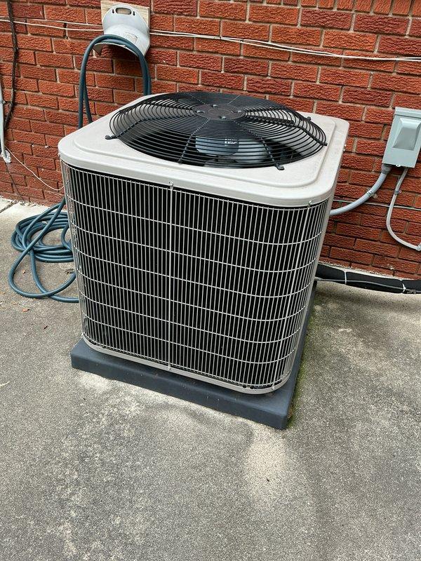 Completed comprehensive Gold AC tune-up on 7-year-old residential air conditioning system with outdoor condenser unit and basement components. Performed full system inspection including refrigerant levels, electrical connections, condenser coil cleaning, fan motor operation, and thermostat calibration. Unit operating within manufacturer specifications with no deficiencies noted; all components functioning properly and system ready for cooling season.
