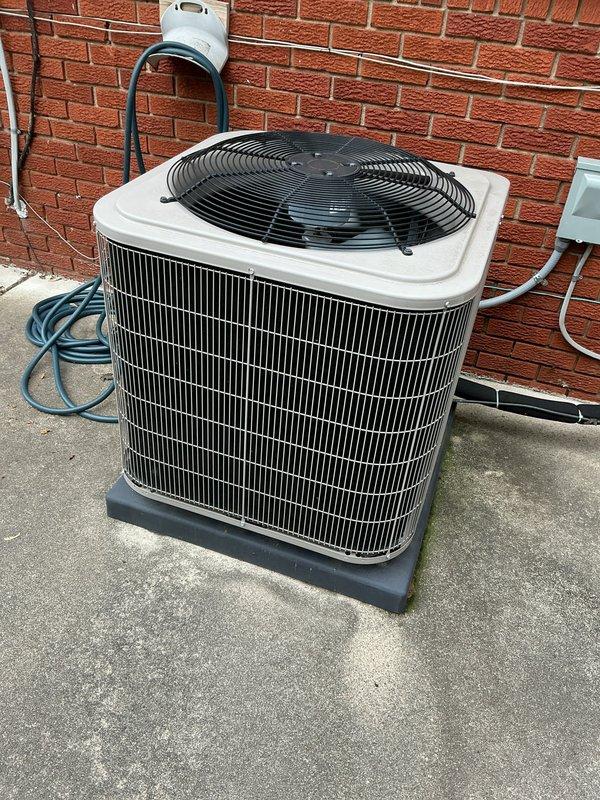Completed comprehensive Gold AC tune-up on 7-year-old residential air conditioning system with outdoor condenser unit and basement components. Performed full system inspection including refrigerant levels, electrical connections, condenser coil cleaning, fan motor operation, and thermostat calibration. Unit operating within manufacturer specifications with no deficiencies noted; all components functioning properly and system ready for cooling season.