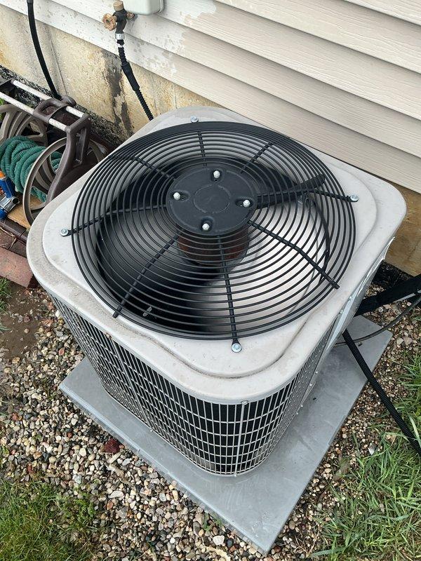 Performed comprehensive AC tune-up on 10-year-old outdoor condenser unit and 15-year-old gas furnace system located in basement. Conducted visual inspection of both units, verified proper operation of gas valve and burner assembly with clean blue flame pattern across all burner ports, and confirmed draft inducer motor functioning correctly. Inspected outdoor condenser unit positioned on concrete pad, checked fan operation and grille condition, verified refrigerant lines and electrical connections secure, and assessed overall system performance. Both heating and cooling components operating within normal parameters with no immediate concerns identified. System maintained per manufacturer specifications with no deficiencies noted during inspection.