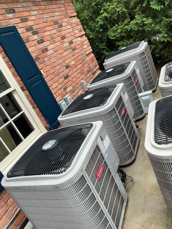 Completed scheduled preventative maintenance on six commercial air conditioning units at a multi-unit facility. Serviced indoor evaporator coils located in basement mechanical room and six outdoor condensing units positioned at ground level on concrete pad. Performed comprehensive maintenance including filter replacement, system inspections, and operational checks on all equipment to ensure proper function for continued reliable operation.