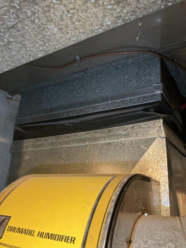 Responded to service call for air conditioning system inspection at residential property. Upon arrival, diagnosed failed capacitor on aging R22 cooling unit experiencing repeated circuit breaker trips. Evaluated existing HVAC system including outdoor condensing unit and indoor air handler with humidifier integration. Documented current equipment condition and electrical service configuration. Prepared comprehensive replacement estimate for new air conditioning system and furnace upgrade to address obsolete refrigerant type and failing components.
