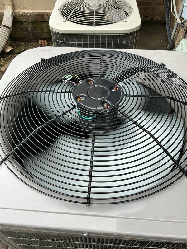Completed comprehensive Gold AC inspection on 5-year-old residential air conditioning system with air handler located in basement. Performed multi-point inspection of outdoor condenser unit including fan motor operation, electrical connections, refrigerant lines, and cabinet condition. Verified proper operation of all system components, inspected auxiliary equipment including accumulator and electrical disconnect, and confirmed condenser area was clear of debris. System found to be operating within normal parameters with all components functioning properly.