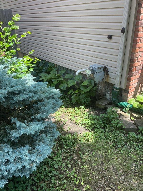 Conducted no-charge second opinion inspection following initial service visit. Master plumber performed comprehensive evaluation of sump pump backup system and its connection to the main sewer line, documenting existing plumbing configuration and identifying potential drainage concerns for customer review.