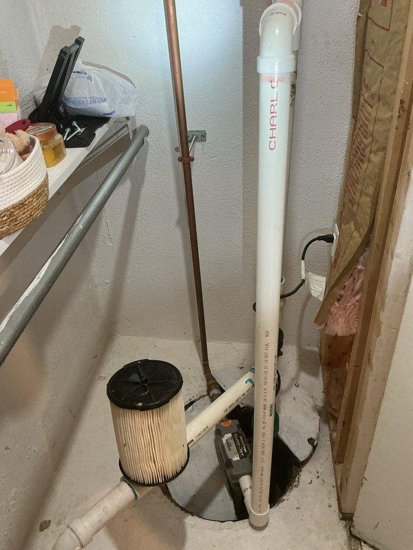Conducted no-charge second opinion inspection following initial service visit. Master plumber performed comprehensive evaluation of sump pump backup system and its connection to the main sewer line, documenting existing plumbing configuration and identifying potential drainage concerns for customer review.
