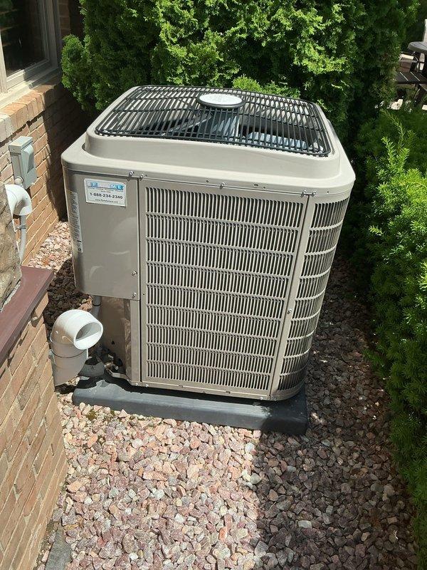 Completed comprehensive NSP AC inspection on 9-year-old residential cooling system with outdoor condensing unit and basement-located air handler. Performed visual assessment of exterior unit mounted on concrete pad, verified proper installation with adequate clearance, inspected refrigerant lines and condensate drainage system, and evaluated overall equipment condition. Notified homeowner of filter replacement requirement to maintain optimal system performance and air quality.