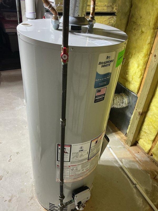 Completed comprehensive NSP AC inspection on 9-year-old residential cooling system with outdoor condensing unit and basement-located air handler. Performed visual assessment of exterior unit mounted on concrete pad, verified proper installation with adequate clearance, inspected refrigerant lines and condensate drainage system, and evaluated overall equipment condition. Notified homeowner of filter replacement requirement to maintain optimal system performance and air quality.