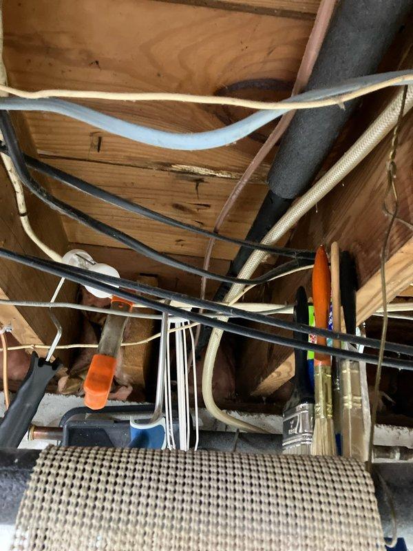Completed full HVAC system replacement including installation of new air handler unit in basement utility area with associated ductwork connections, condensate drain lines, and refrigerant piping routed through attic space. All components properly secured, insulated, and connected per manufacturer specifications to address non-cooling issue from previously installed equipment.