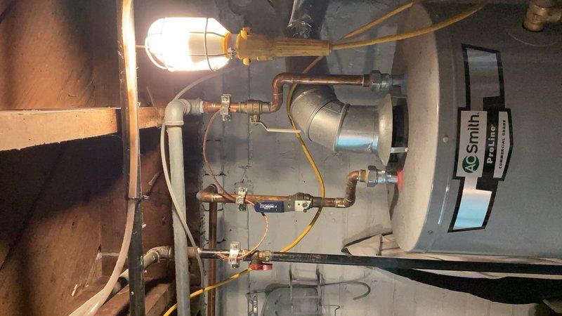 Completed Gold AC inspection on 7-year-old residential air conditioning system. Verified operational status of outdoor condenser unit and basement-located air handler components. Performed comprehensive visual inspection of refrigerant lines, electrical connections, and condensate drainage system. All equipment found to be functioning properly with no immediate service needs identified at time of inspection.