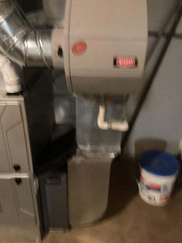 Completed comprehensive estimate for HVAC system replacement including two air conditioning units and two furnaces. Evaluated existing equipment configuration in mechanical room with overhead-mounted air handler, ductwork, and drainage systems. Assessed current thermostat setup including ecobee smart thermostat and provided recommendations for automatic heating/cooling changeover capability on both first floor and upper level units to meet operational requirements for seamless seasonal transitions.