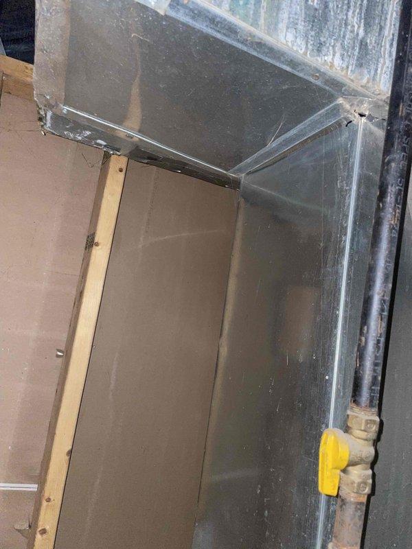 Provided estimate for air conditioning system installation to work with existing 10+ year old natural gas heating equipment located in basement. Property currently has no functioning AC unit. Assessment included evaluation of existing ductwork, plenum connections, and mechanical space to determine compatibility and installation requirements for new cooling system.