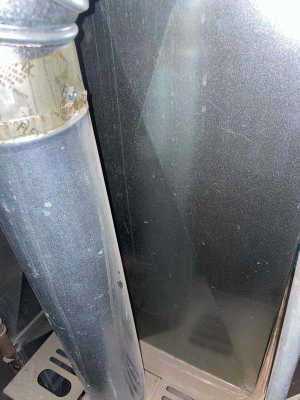 Provided estimate for air conditioning system installation to work with existing 10+ year old natural gas heating equipment located in basement. Property currently has no functioning AC unit. Assessment included evaluation of existing ductwork, plenum connections, and mechanical space to determine compatibility and installation requirements for new cooling system.