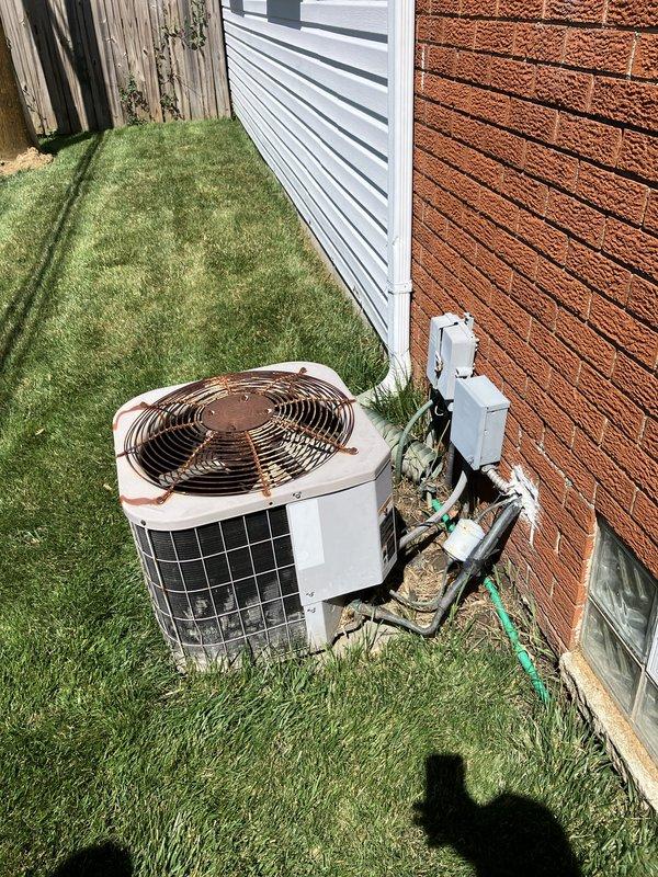 Conducted on-site assessment for complete HVAC system replacement at owner-occupied residence. Evaluated existing basement-mounted forced air furnace and outdoor condensing unit, both showing significant age-related deterioration including rust, discoloration, and accumulated wear. Documented current system configuration including ductwork layout, electrical connections, and equipment placement between structures. Prepared comprehensive replacement estimate for full heating and cooling system installation.